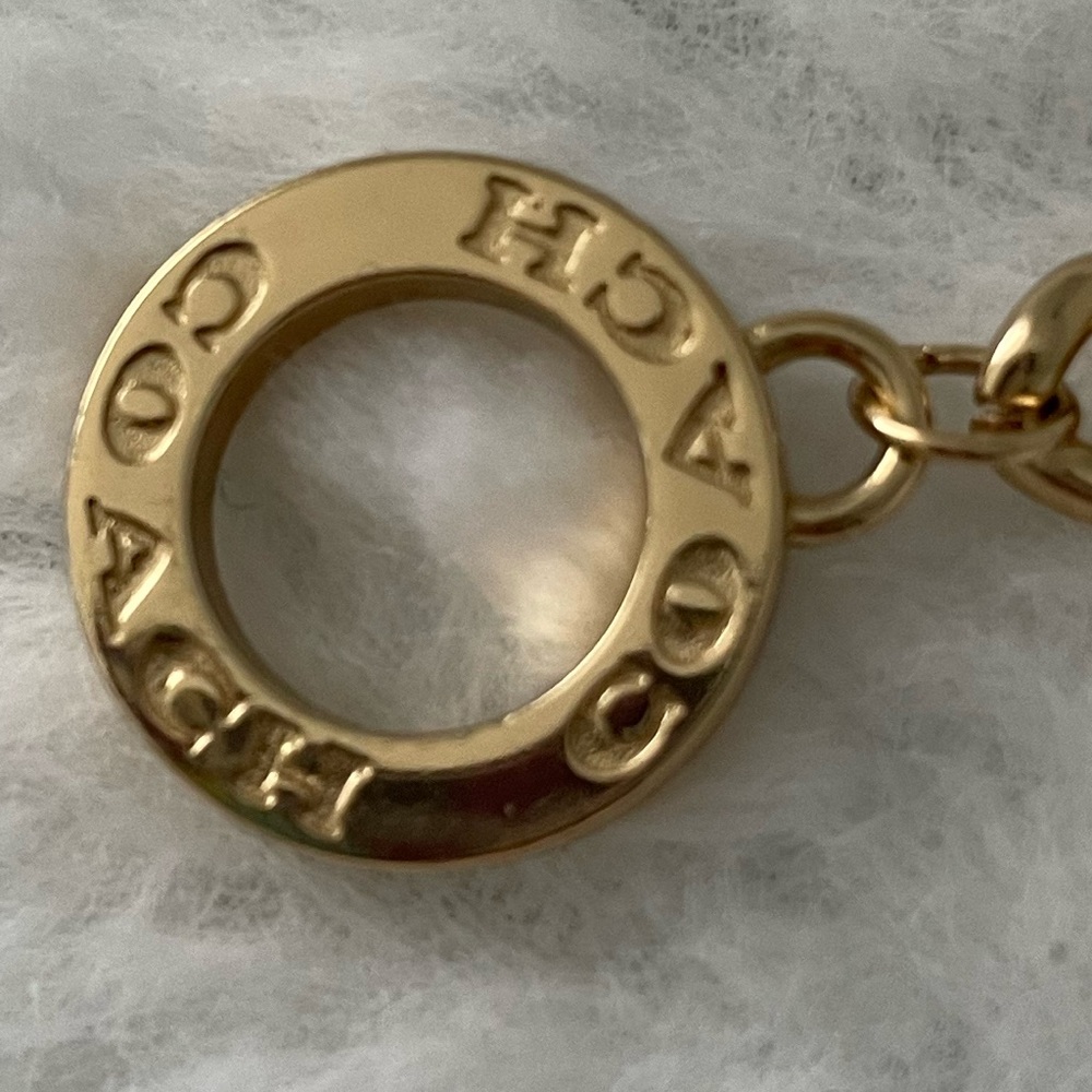 Coach chain dangle gold bracelet